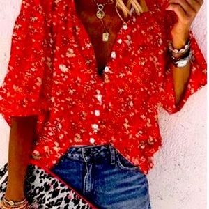 BEAUTIFUL button down blouse, bright beautiful colors make this top a go to!!